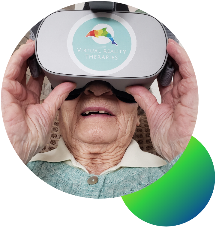An old person wearing a VR headset